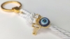 Picture of 10 pcs Keychain Baptism favors gold cross evil eye